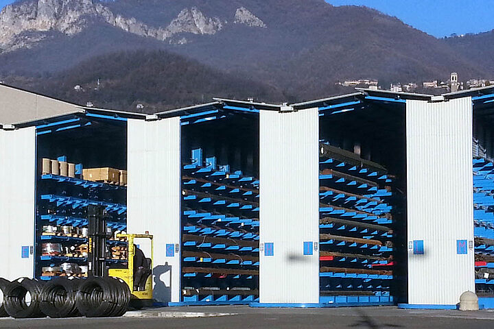 Cantilever racking with roof, rack-clad warehouse